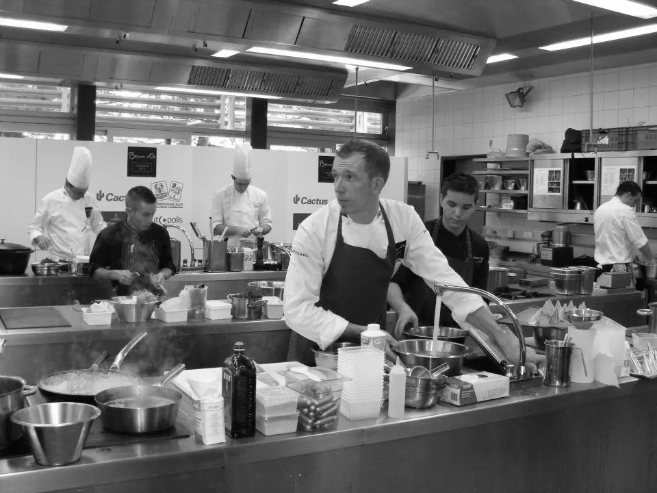 Christophe Prosperi cooking in a professional kitchen competition, early in his career