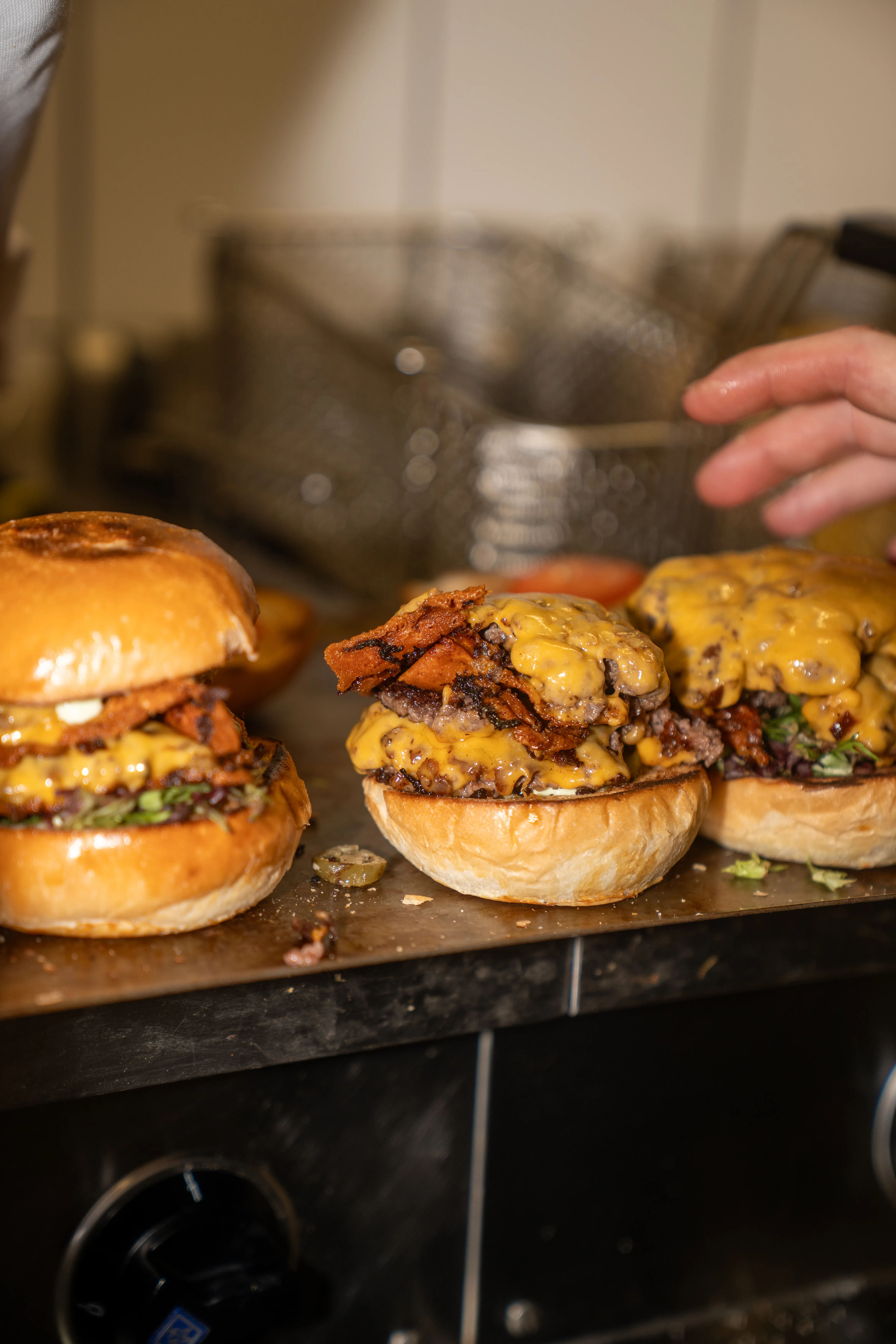 Bacon cheeseburgers ready to serve