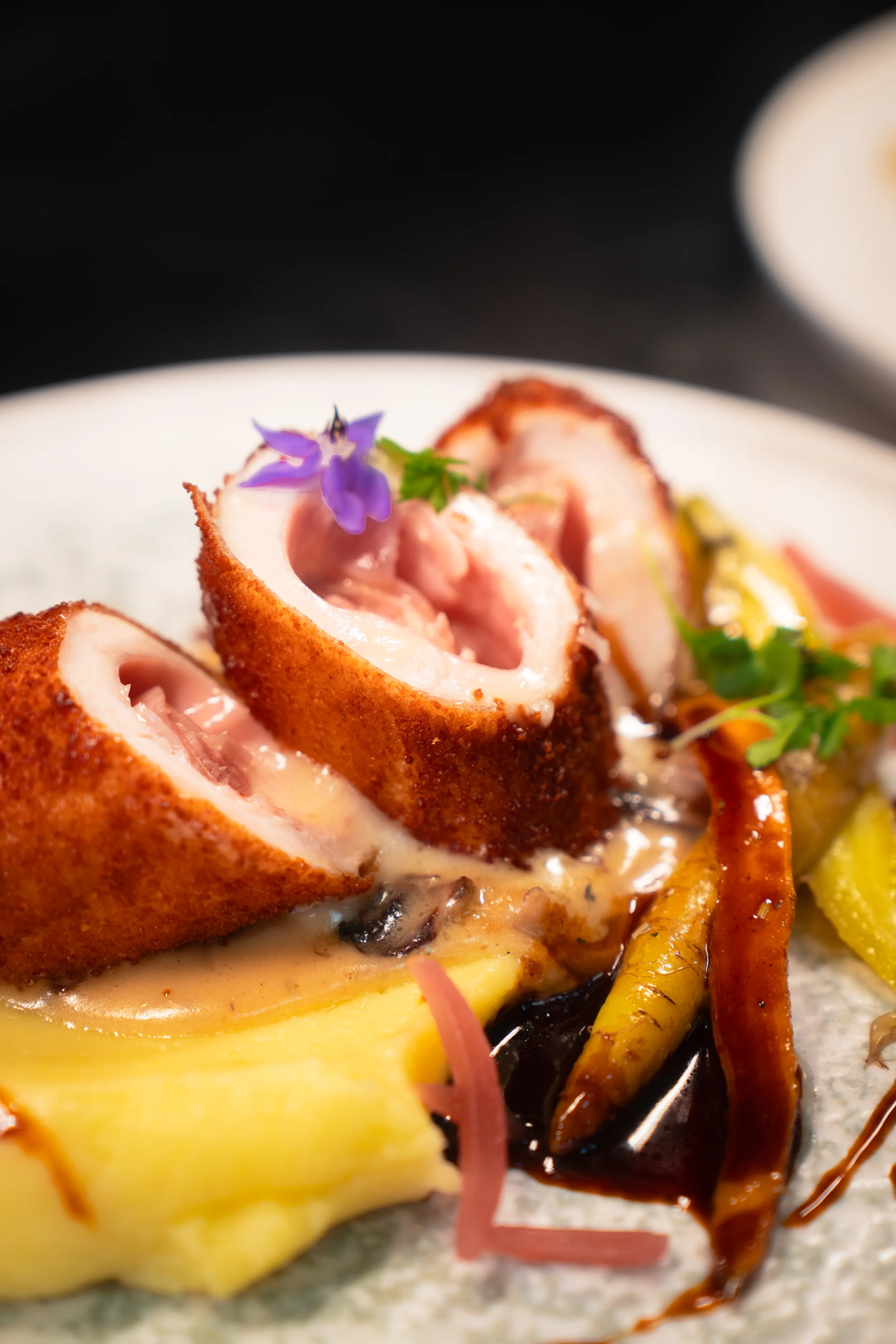 Ballotine roulade sliced open on a plate