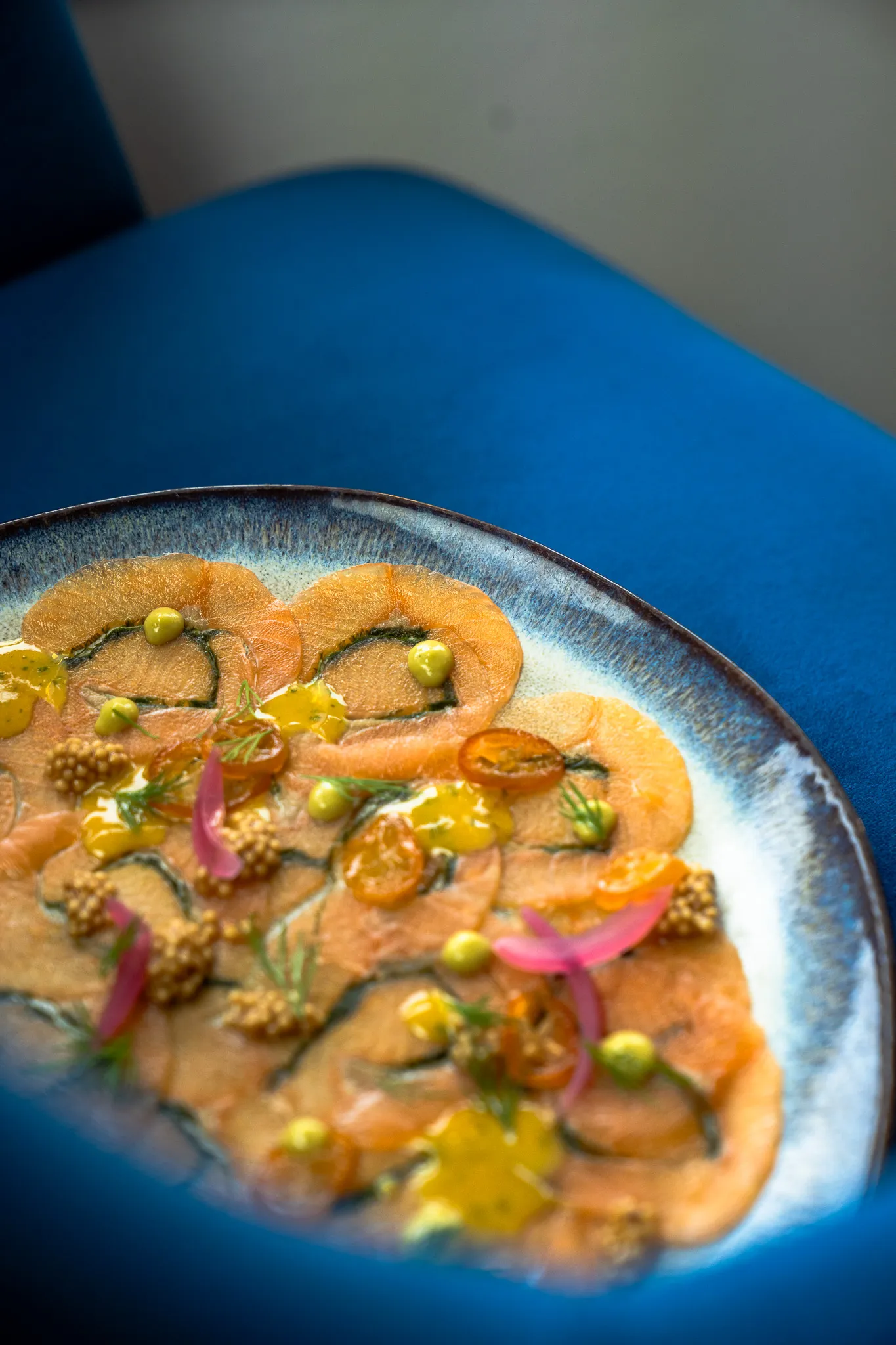 Cured salmon carpaccio with pickled shallot and citrus